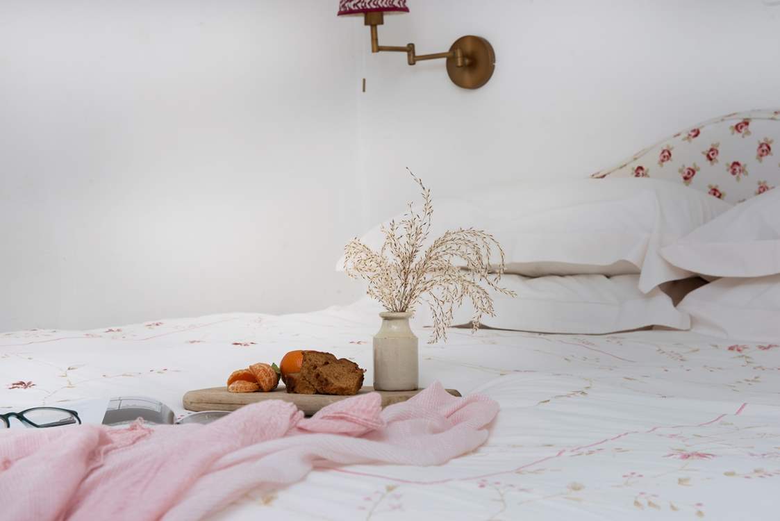 The bedroom has a romantic feel about it.
