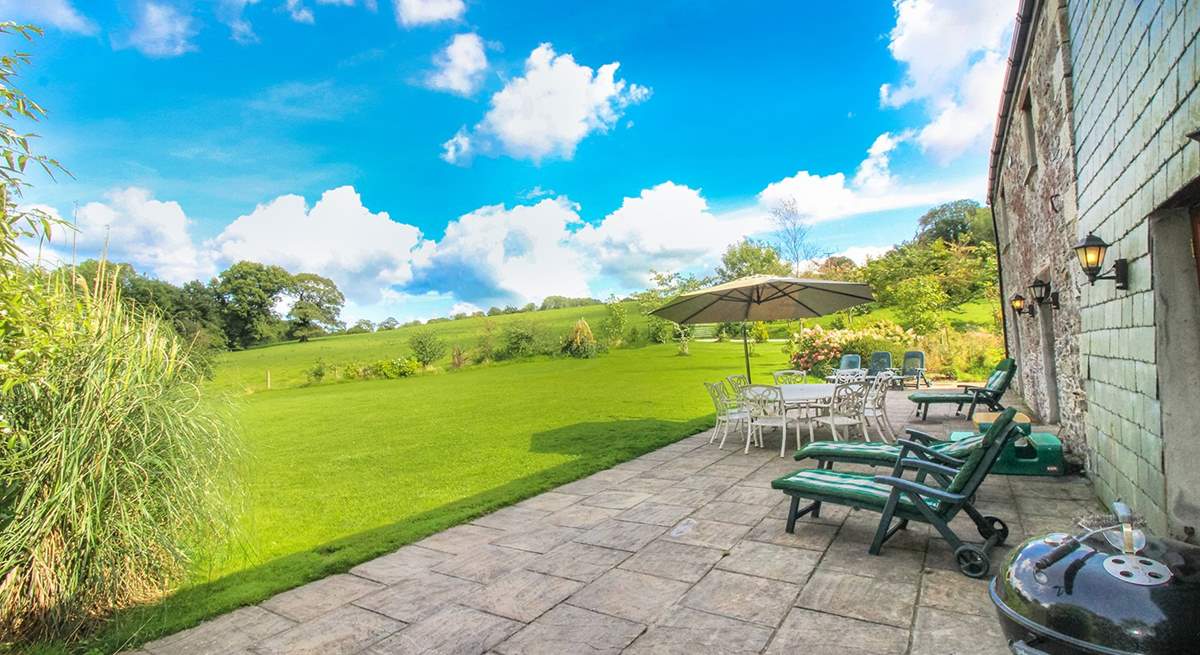 The large terrace and enclosed garden will ensure you make the most of the setting.