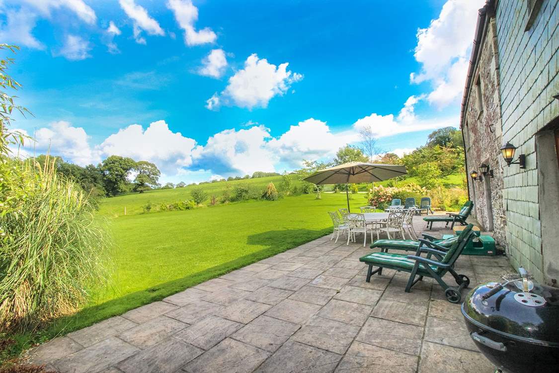 The large terrace and enclosed garden will ensure you make the most of the setting.