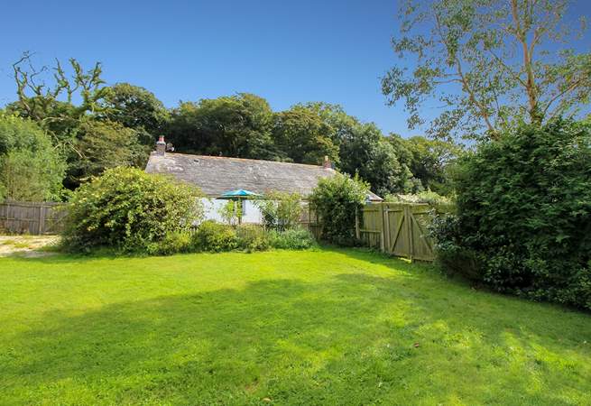 The large garden is enclosed - ideal for any four-legged friends.