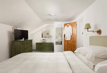 The bedroom is surprisingly spacious.