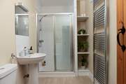The shower-room is located close to bedrooms two and three.
