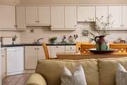 The kitchen is really well-equipped and for extra storage, there's a spacious utility-room as well.