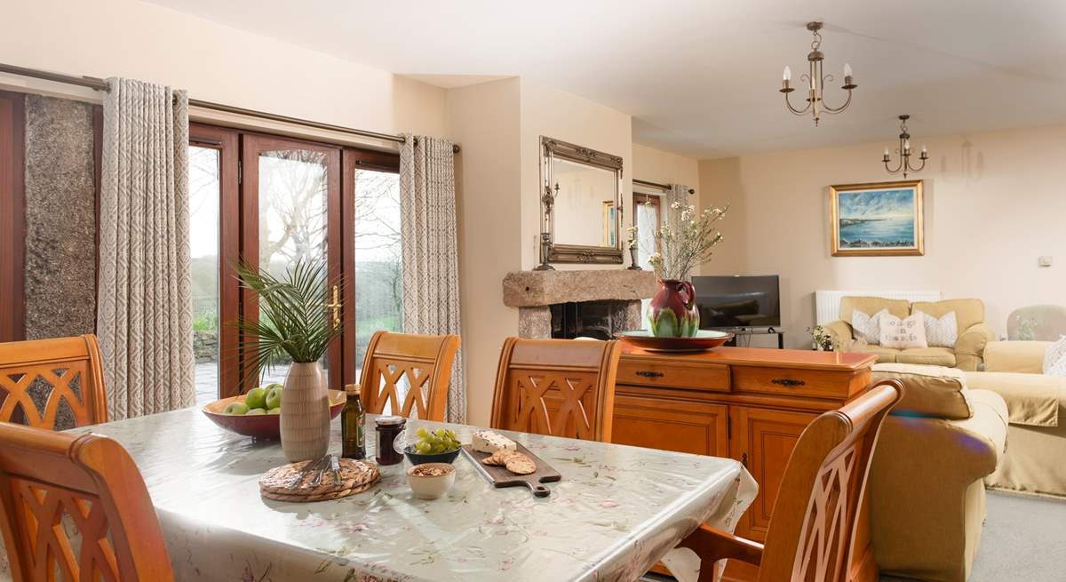 Patio doors lead out to the sunny terrace.