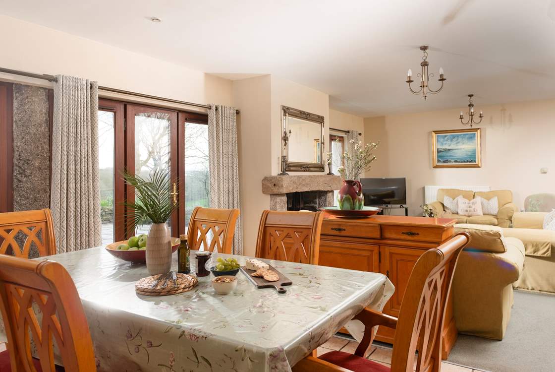 Patio doors lead out to the sunny terrace.
