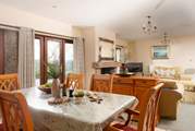 Patio doors lead out to the sunny terrace.