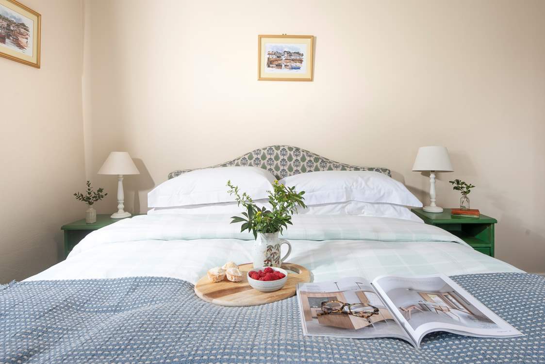 Snuggle up under the covers of the king-size bed in bedroom one.
