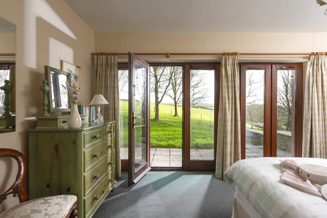 The large windows let the light flood in - it's a wonderful view to wake up to.