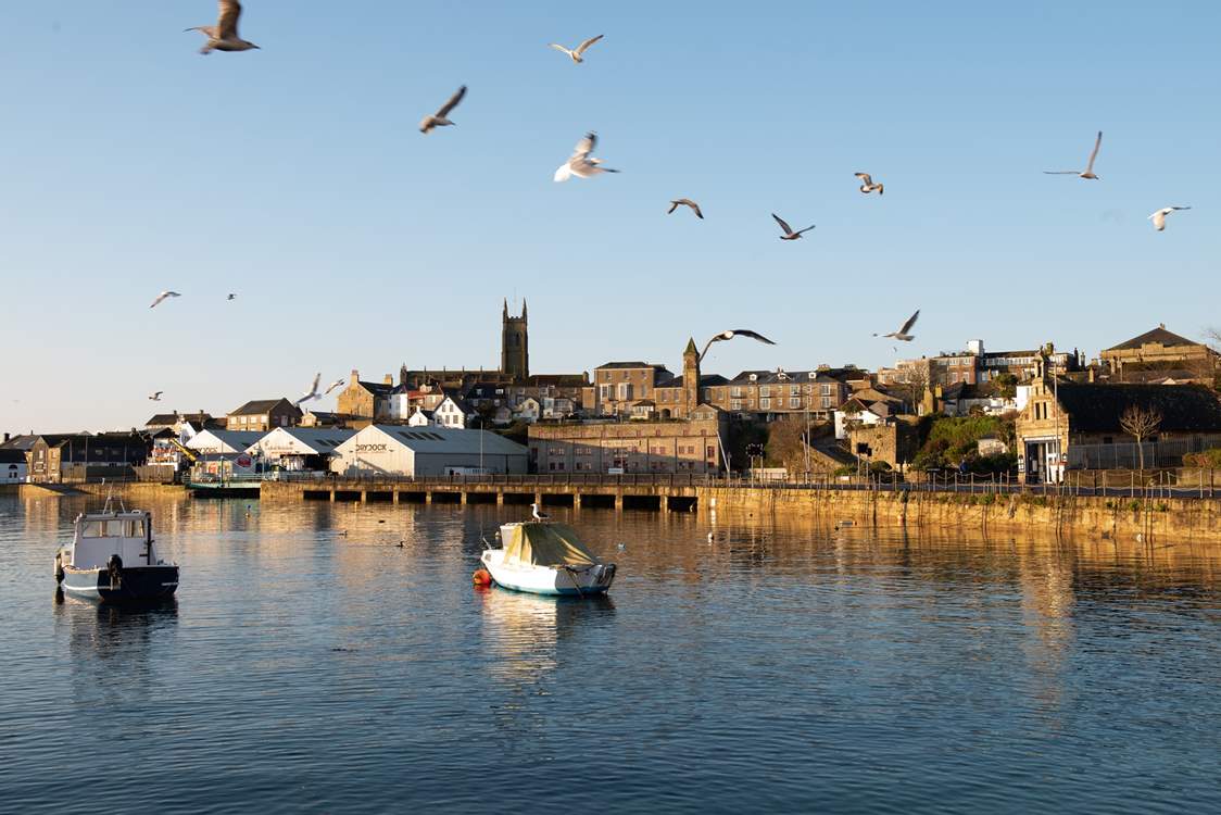 Spend a day in Penzance, take a walk along the harbour and stop for a cream tea in one of the many cafes dotted around the town.
