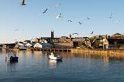 Spend a day in Penzance, take a walk along the harbour and stop for a cream tea in one of the many cafes dotted around the town.
