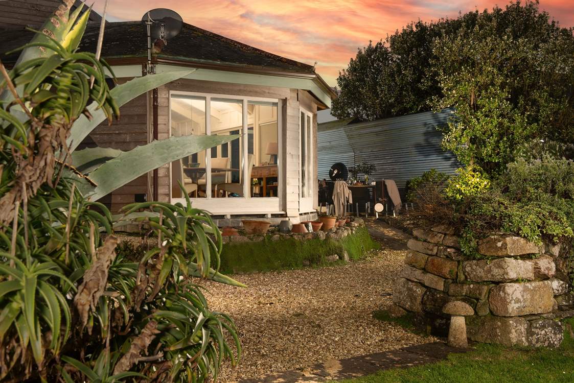 Enjoy al fresco suppers at the dreamy Trebarvah Farmhouse.