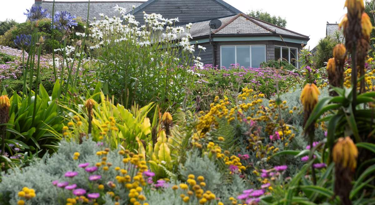 In the summer months, the garden is a blaze of colour.