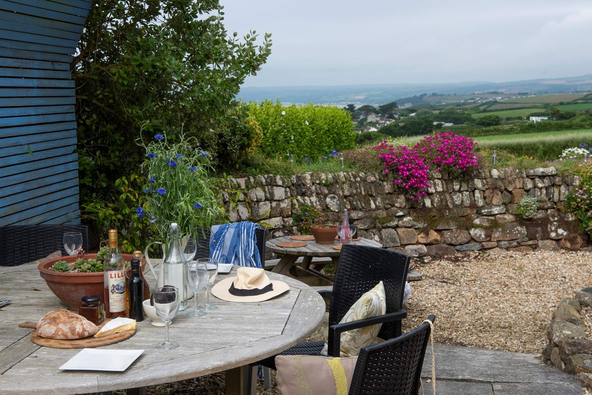 Expansive countryside vistas marry seamlessly with views of the mighty blue ocean just over the hedge, so close you can smell the salty sea air. 