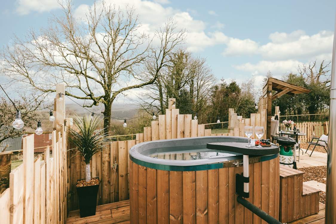 The perfectly positioned wood-fired hot tub awaits! 