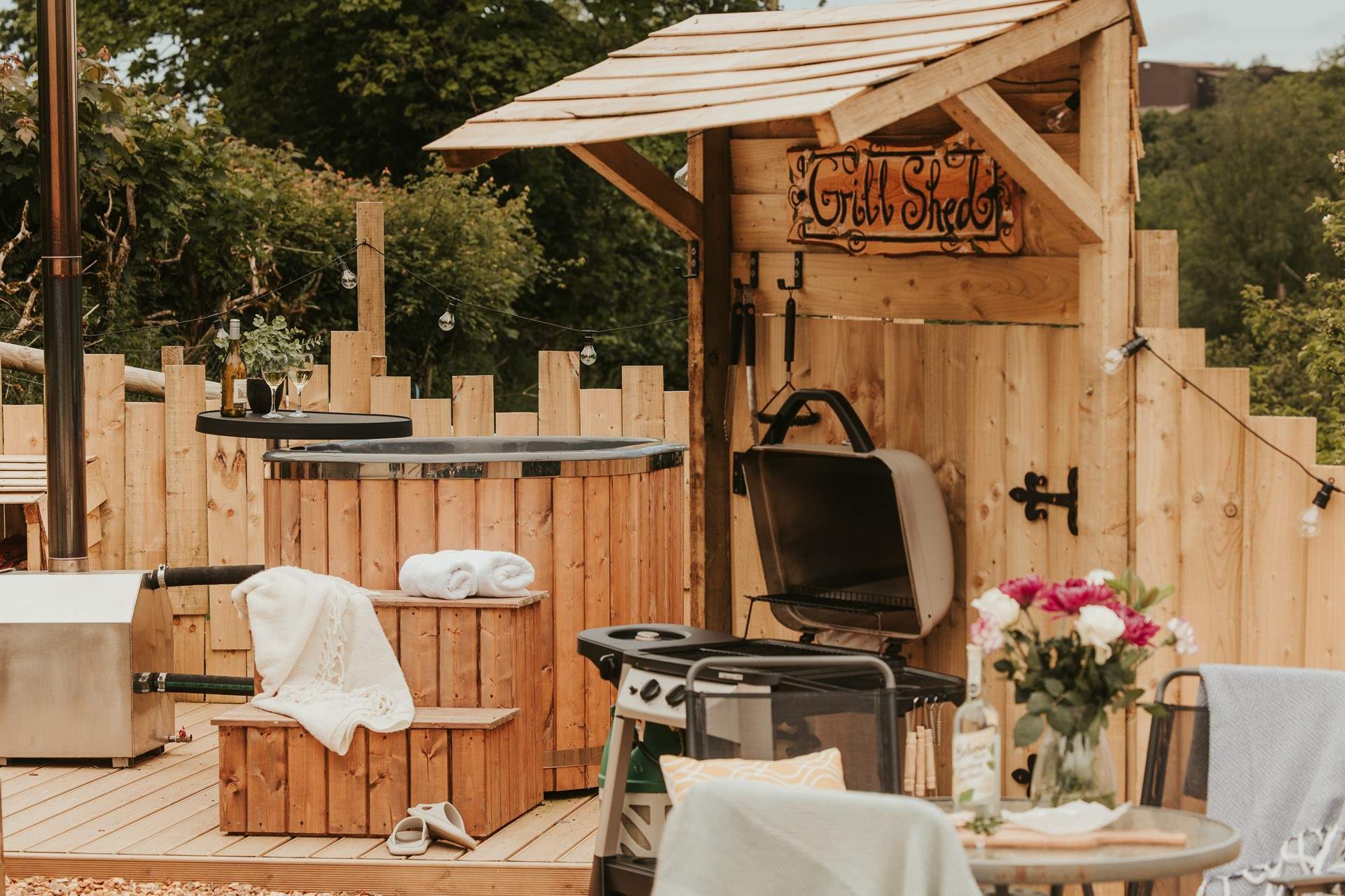 The perfectly positioned wood-fired hot tub awaits! 
