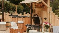 The perfectly positioned wood-fired hot tub awaits! 
