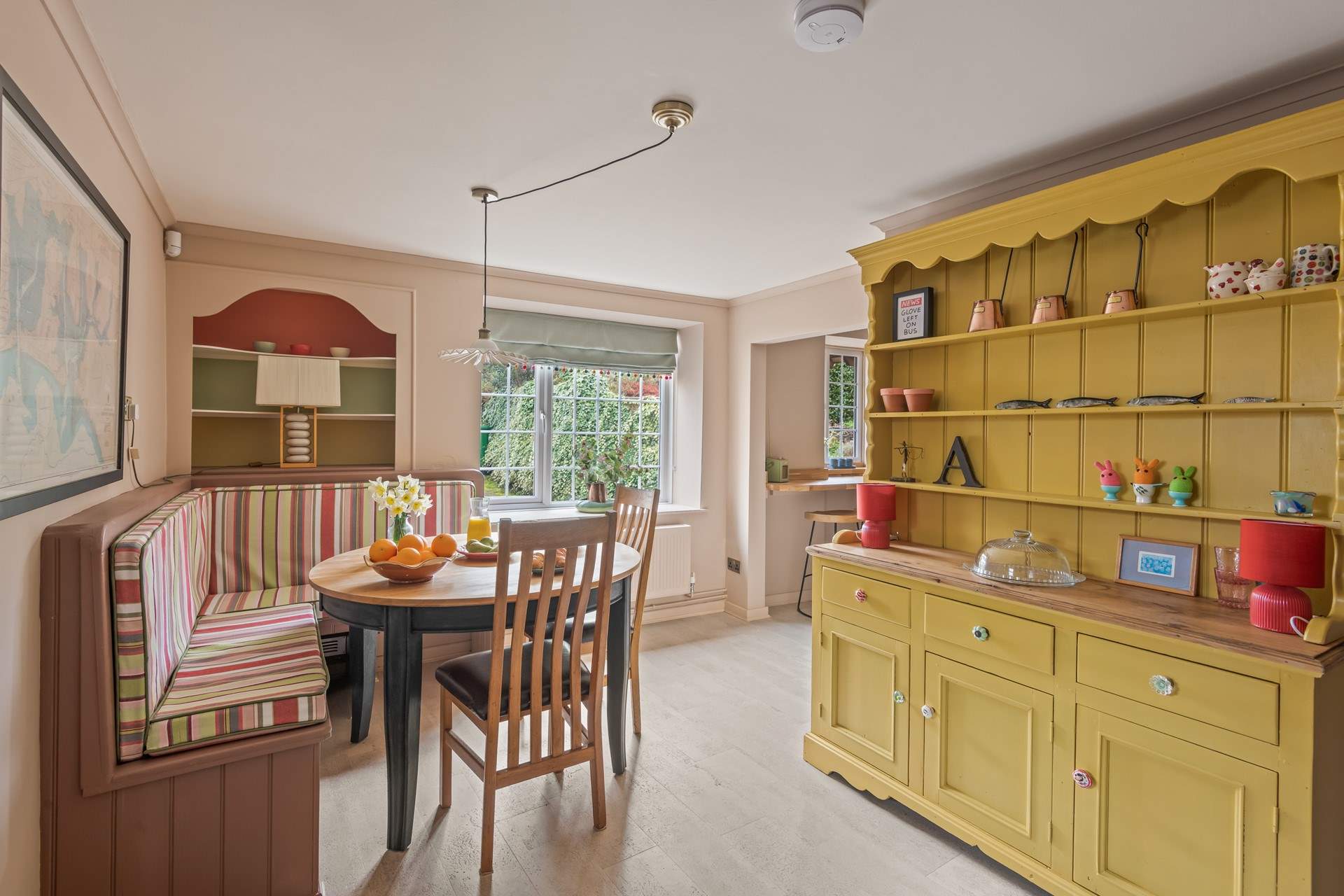 The dining space is both spacious and inviting. Perfect for four lucky guests.