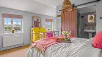 Bedroom one offers magnificent countryside views.