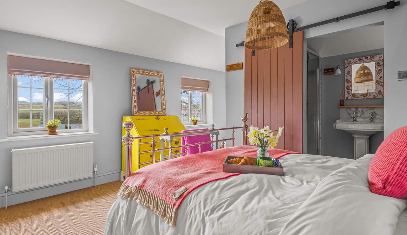 Bedroom one offers magnificent countryside views.