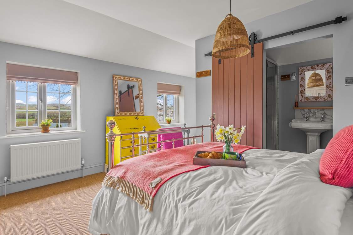 Bedroom one offers magnificent countryside views.