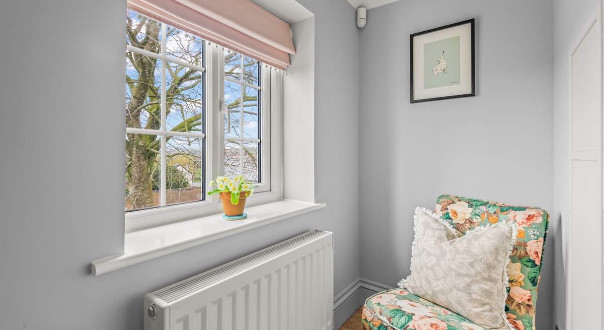 Bedroom one even offers this cosy chair to sit back in and enjoy a good book in total tranquility.