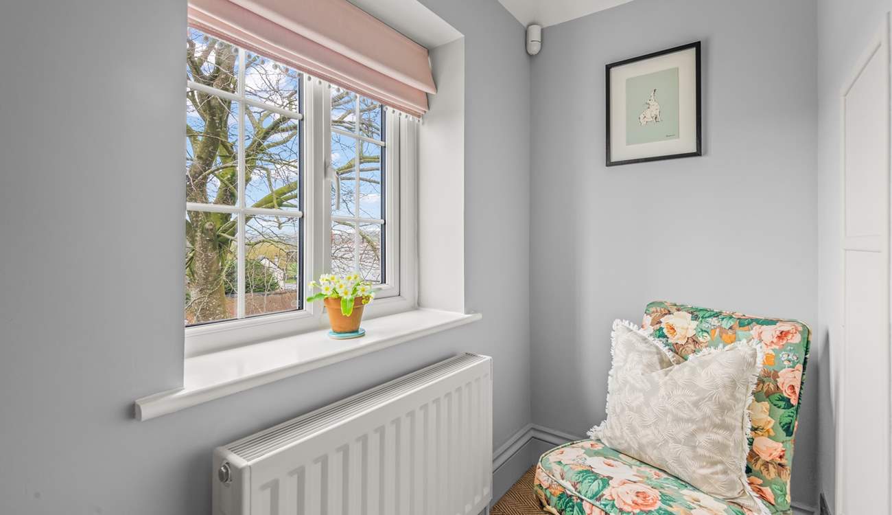 Bedroom one even offers this cosy chair to sit back in and enjoy a good book in total tranquility.