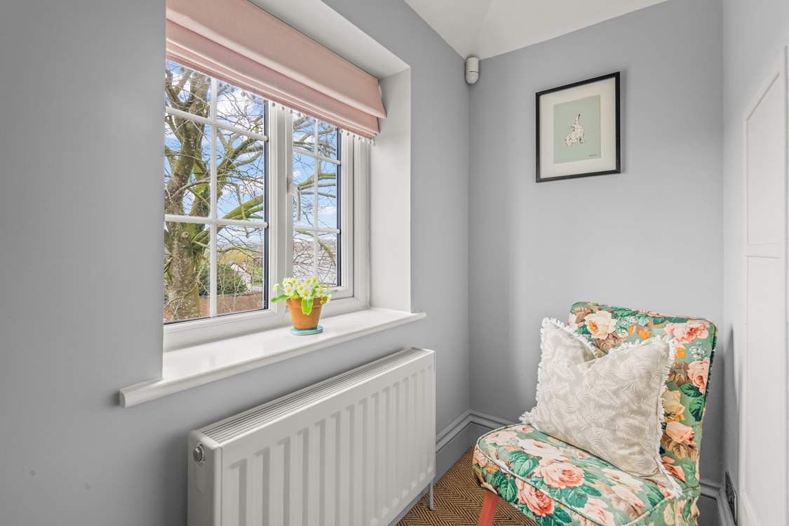 Bedroom one even offers this cosy chair to sit back in and enjoy a good book in total tranquility.