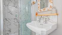 The sparkling shower in Bedroom one's en suite.