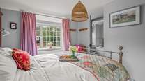 Bedroom two is home to a fabulous en suite bathroom.