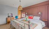 Bedroom two is full of light and bright, cheerful colours. - Thumbnail Image