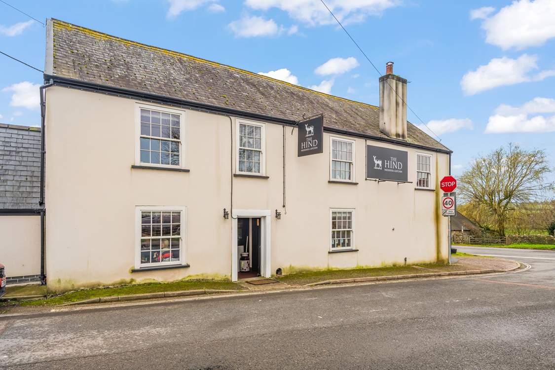 The local pub awaits with a warm Devon welcome.