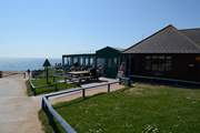 The Hive Beach Cafe at nearby Burton Bradstock serves locally-caught seafood and delicious cakes.