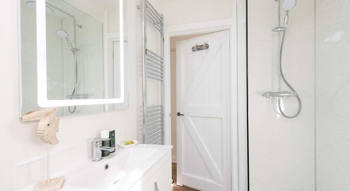 The shower-room with power shower sits between the two bedrooms.