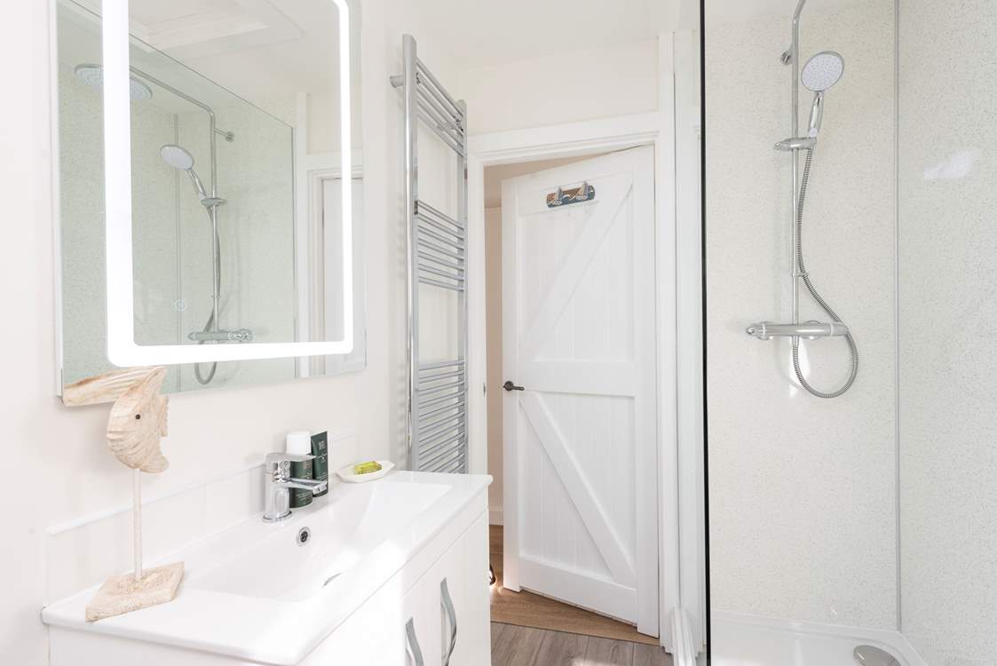 The shower-room with power shower sits between the two bedrooms.