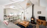 This charming cottage has an open plan living area, complete with a cosy wood-burner for those chillier evenings. - Thumbnail Image