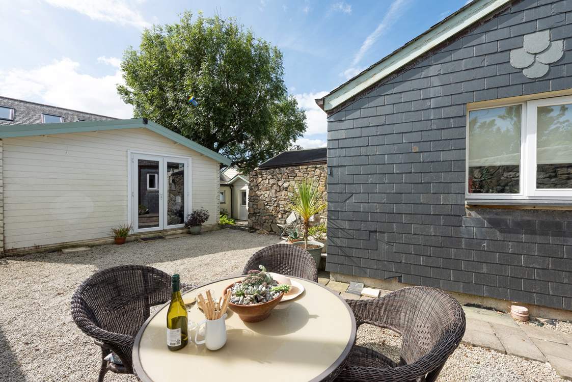 The secluded courtyard is perfect for al fresco dining. It is not enclosed so please be mindful if you have your doggy with you.