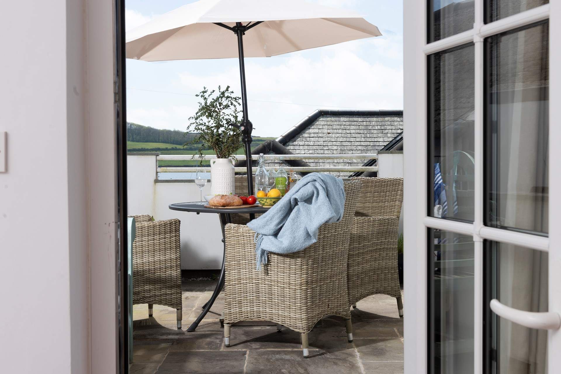 Step outside onto the patio area and enjoy your morning coffee.