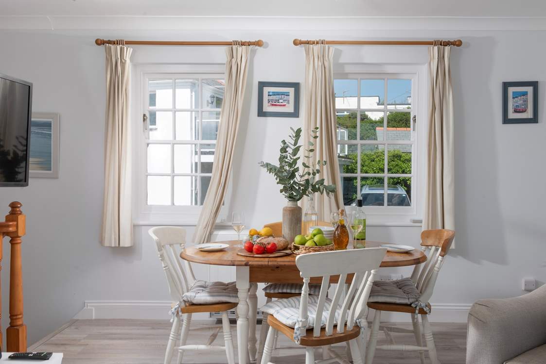 Gather everyone around the dining-table to plan your adventures for the day ahead.