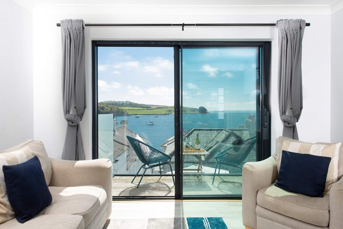 Sliding doors from the living area lead to a beautiful balcony.