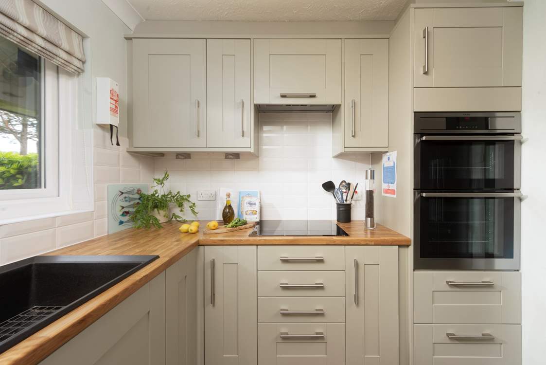 A stylish Shaker-style kitchen at 65 Lower Maen Cottage.