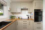 A stylish Shaker-style kitchen at 65 Lower Maen Cottage.