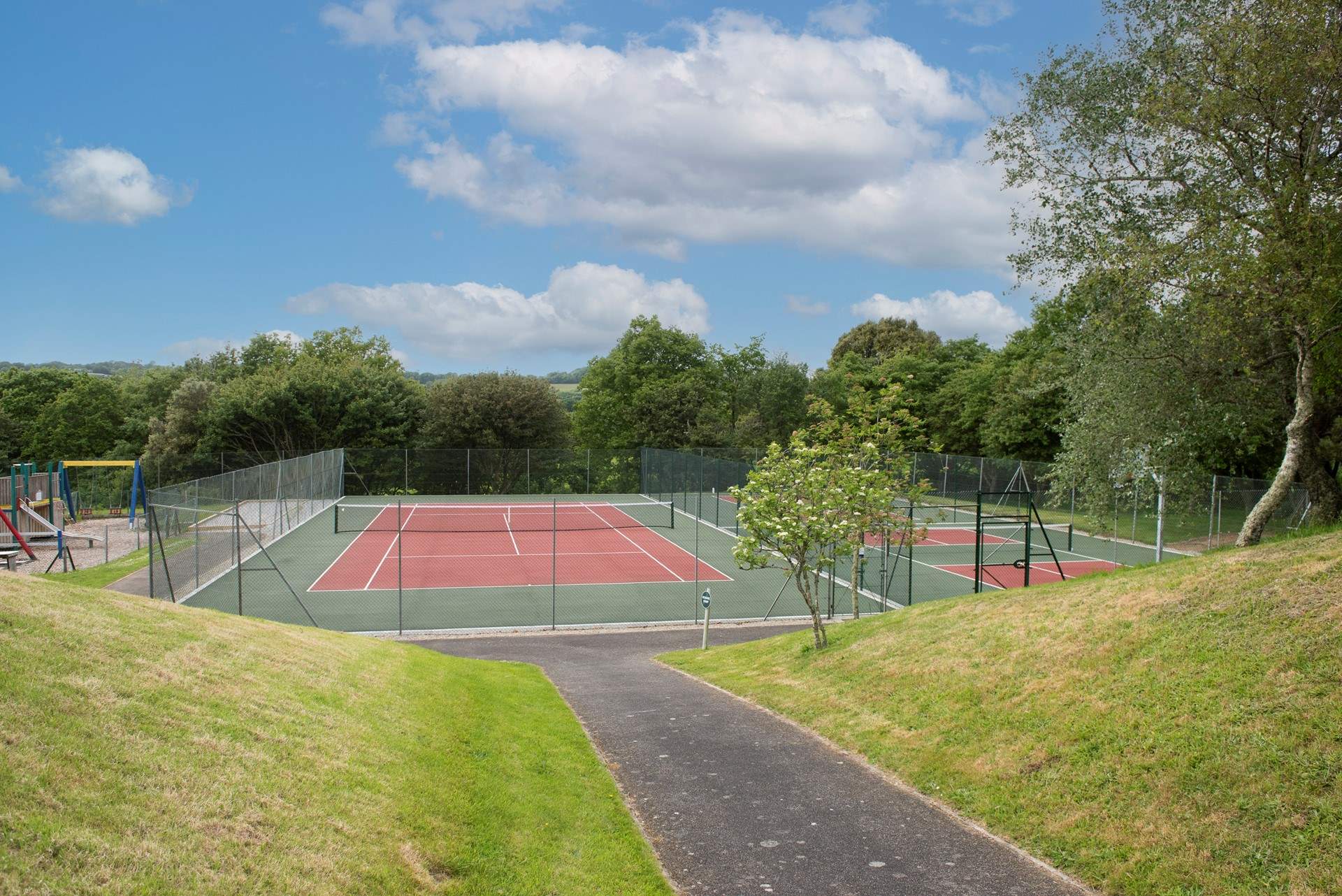 There are tennis courts and pickleball courts on site. 