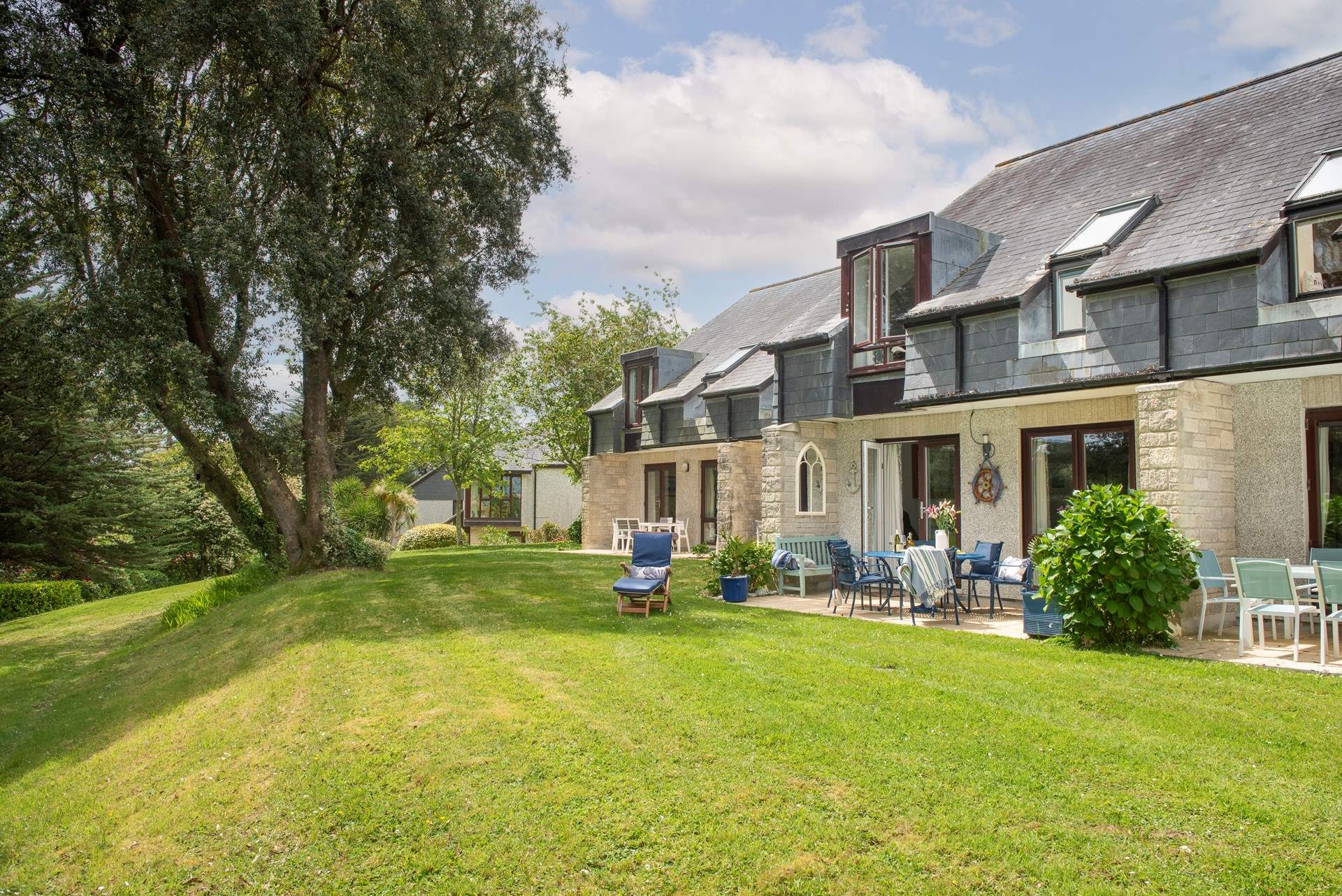 65 Lower Maen Cottage is the middle property with the lovely blue furniture. 