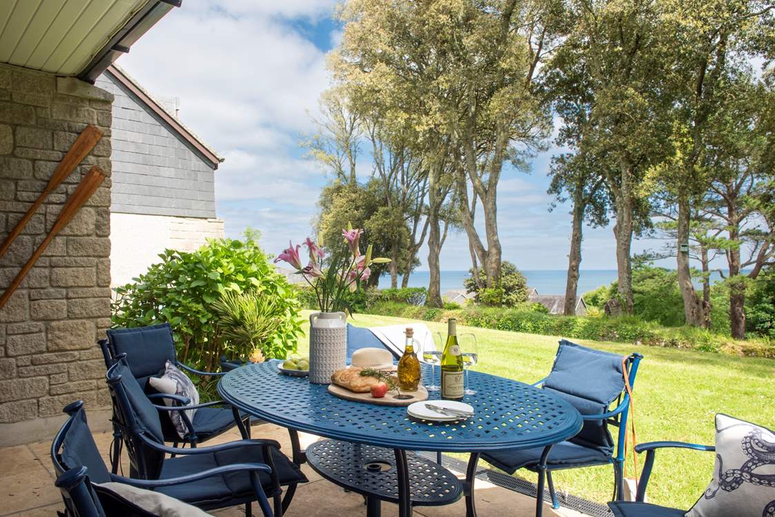 Through the double doors to your patio - why go anywhere else with a view like that.