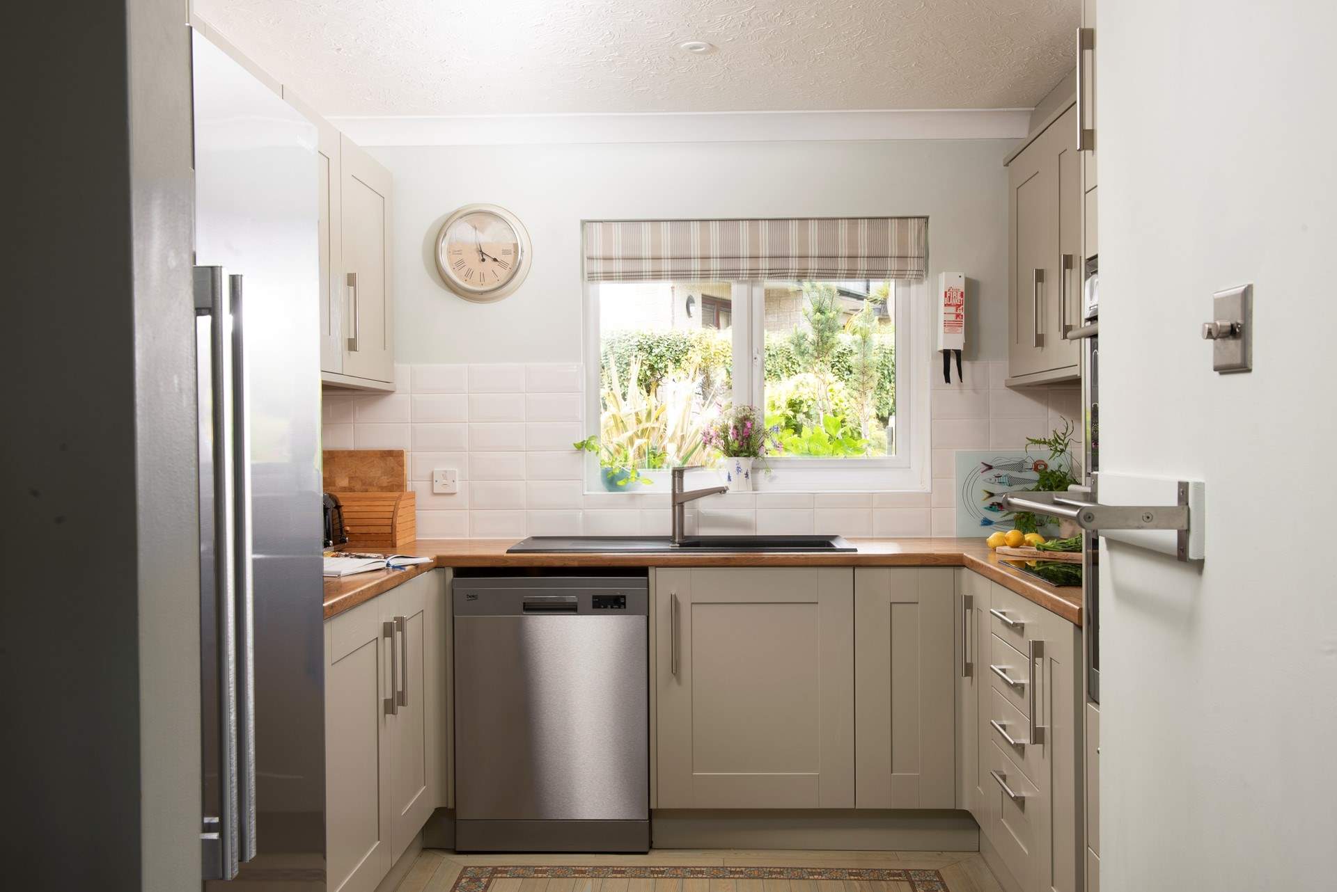 The kitchen has a large American-style fridge/freezer, perfect for a family of six on holiday. 