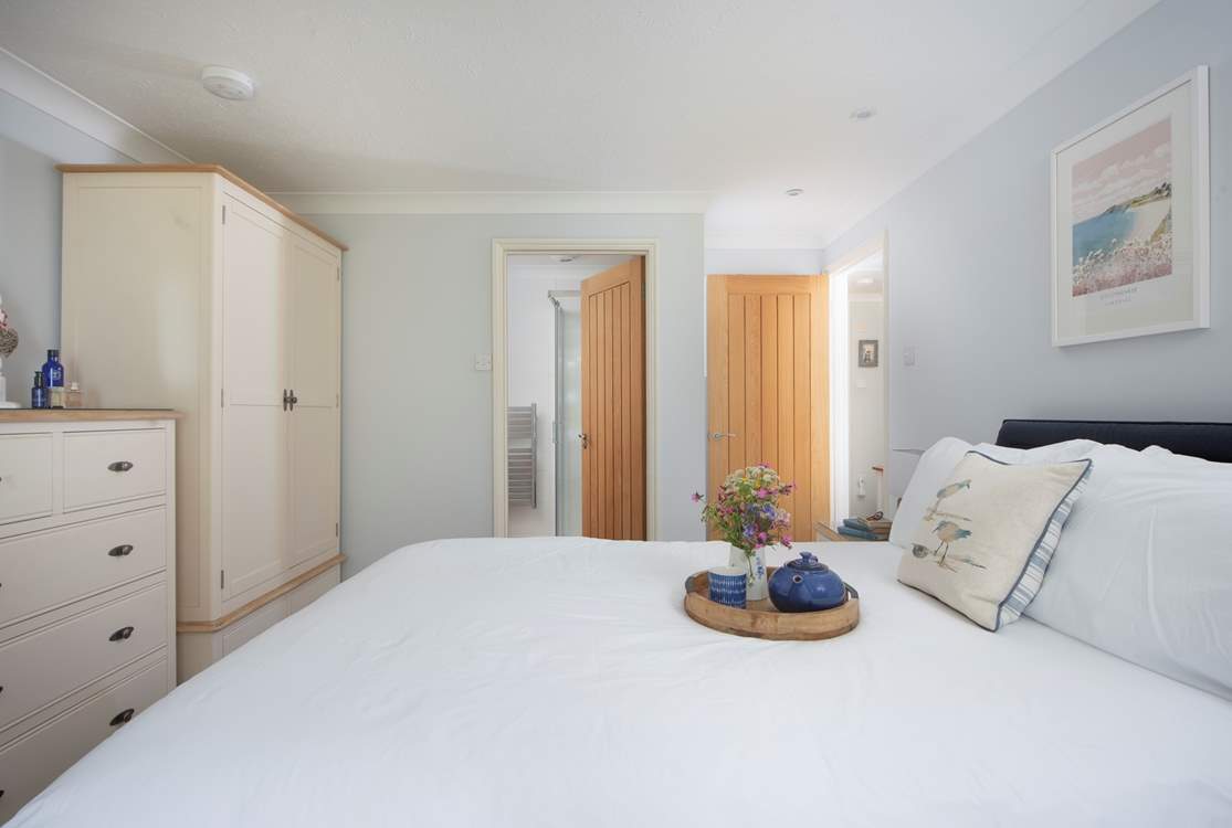 The main bedroom has its own en suite shower-room.