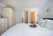 The main bedroom has its own en suite shower-room.