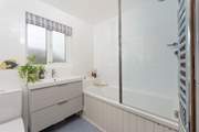 The light and airy family bathroom.