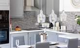 Watch the budding chef at work in this sociable space. - Thumbnail Image