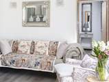 Relax on the beautiful Chesterfield sofa or the comfy armchair. 